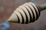 Hand-carved wooden honey dipper